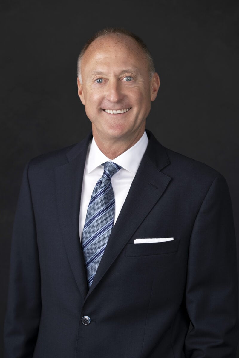 Lorenzen Headshot 2023 (dark background)